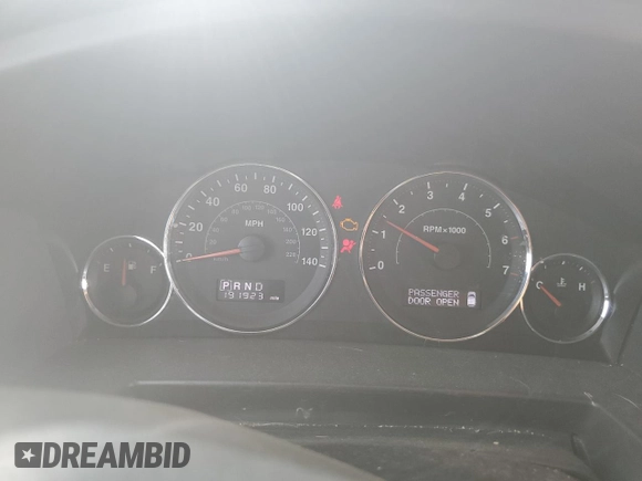 2009 Jeep Commander Sport z VIN 1J8HH48K79C501349, wystawiony jako Copart lot #62368885 z przebiegiem 191 923 mil mil oraz Szkoda całkowita • Salvage title. Historia ofert i sprzedaży dostępna na DreamBid. Obrazek 9.