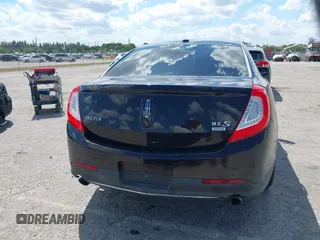 2014 Lincoln MKS with VIN 1LNHL9EK0EG608300, listed as a IAAI auction lot 41900902 with 144,253 mi miles. Bid and sale history available at carsss.com. Image 16.
