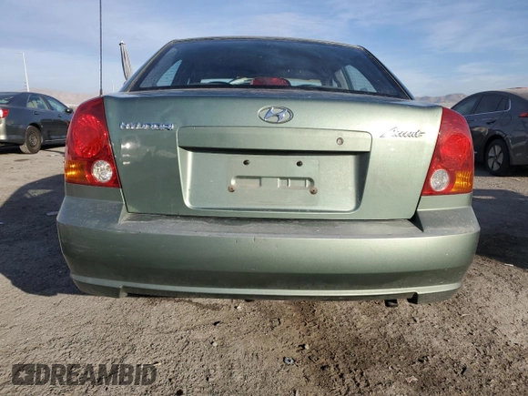 2004 Hyundai Accent GL with VIN KMHCG45C44U531828, listed as a Copart auction lot 86428134 with 92,054 mi miles and Salvage Title. Bid and sale history available at carsss.com. Image 6.