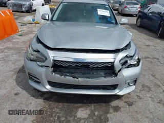 2014 Infiniti Q50 Premium z VIN JN1BV7AP9EM690381, wystawiony jako IAAI lot #41761562 z przebiegiem 107 099 mil mil oraz . Historia ofert i sprzedaży dostępna na DreamBid. Obrazek 6.