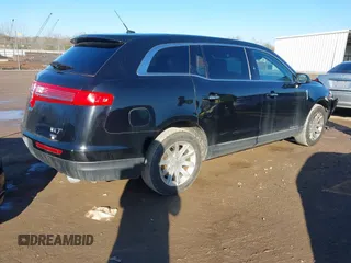 2018 Lincoln MKT with VIN 2LMHJ5NK5JBL02245, listed as a IAAI auction lot 41430571 with 293,537 mi miles and . Bid and sale history available at carsss.com. Image 4.