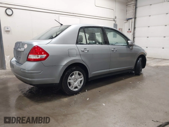 2011 Nissan Versa S with VIN 3N1BC1AP9BL485989, listed as a IAAI auction lot 42414692 with 122,213 mi miles and . Bid and sale history available at DreamBid. Image 4.