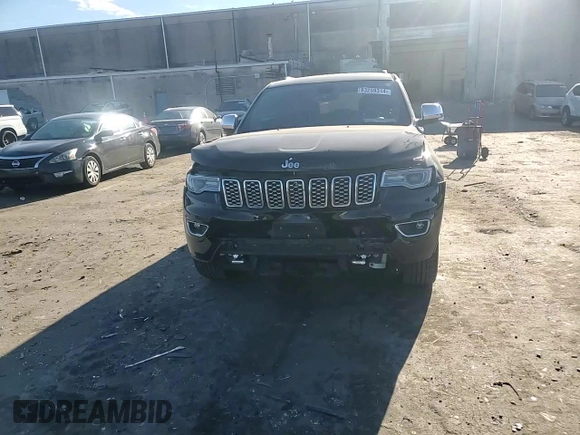 2017 Jeep Grand Cherokee Overland with VIN 1C4RJFCT7HC684746, listed as a Copart auction lot 83259314 with 106,848 mi miles and Salvage Title. Bid and sale history available at carsss.com. Image 12.