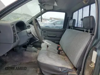 1994 Nissan Frontier with VIN 1N6SD11S2RC341136, listed as a Copart auction lot 57107995 with 174,479 mi miles and Salvage title. Bid and sale history available at DreamBid. Image 7.