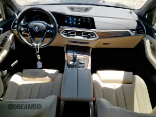 2021 BMW X5 sDrive40i with VIN 5UXCR4C09M9G23111, listed as a Copart auction lot 60509475 with 34,230 mi miles and Salvage title. Bid and sale history available at DreamBid. Image 8.