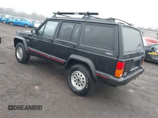 1995 Jeep Cherokee Sport with VIN 1J4FJ68S7SL572730, listed as a IAAI auction lot 41474520 with 189,907 mi miles. Bid and sale history available at carsss.com. Image 3.