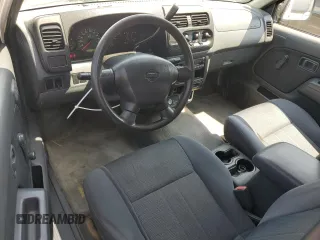 2001 Nissan Frontier XE with VIN 1N6DD26S71C385578, listed as a Copart auction lot 59875405 with 73,936 mi miles and Salvage title. Bid and sale history available at DreamBid. Image 8.