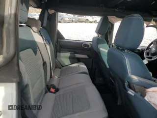 2021 Ford Bronco z VIN 1FMEE5BP2MLA72638, wystawiony jako Copart lot #47970155 z przebiegiem 58 250 mil mil oraz Szkoda całkowita • Salvage title. Historia ofert i sprzedaży dostępna na DreamBid. Obrazek 11.