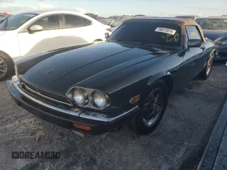 1988 Jaguar XJS z VIN SAJNV5841JC145870, wystawiony jako Copart lot #76612974 z przebiegiem 30 582 mil mil oraz Nie do naprawy. Historia ofert i sprzedaży dostępna na DreamBid. Obrazek 1.