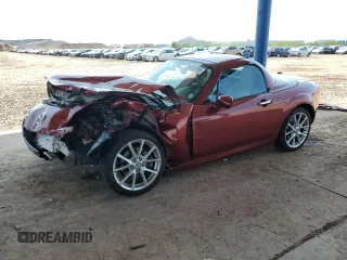 2010 Mazda MX-5 Miata Grand Touring with VIN JM1NC2FF7A0212531, listed as a Copart auction lot 59436915 with 64,889 mi miles and Salvage title. Bid and sale history available at DreamBid. Image 1.