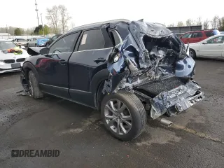 2020 Mazda CX-30 Premium z VIN 3MVDMBEM8LM121954, wystawiony jako Copart lot #51322965 z przebiegiem Nie podano mil oraz Nie do naprawy • Non repairable. Historia ofert i sprzedaży dostępna na DreamBid. Obrazek 2.
