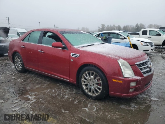 2010 Cadillac STS AWD z VIN 1G6DU6EV3A0131148, wystawiony jako Copart lot #44047375 z przebiegiem 147 556 mil mil oraz Szkoda całkowita • Salvage title. Historia ofert i sprzedaży dostępna na DreamBid. Obrazek 4.