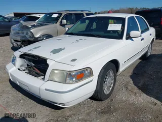 2007 Mercury Grand Marquis LS with VIN 2MEFM75V57X630666, listed as a IAAI auction lot 41791234 with 155,290 mi miles. Bid and sale history available at carsss.com. Image 17.