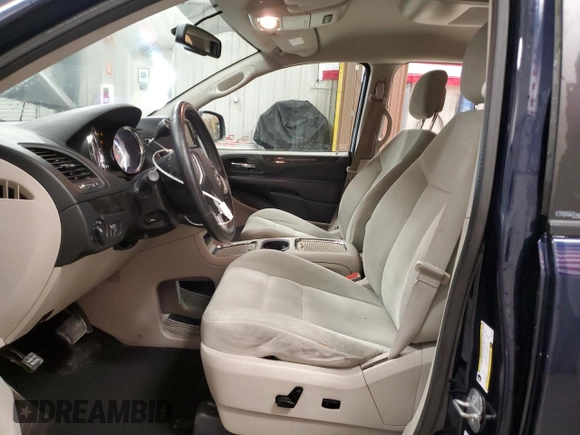 2014 Dodge Grand Caravan SXT z VIN 2C4RDGCG7ER274497, wystawiony jako Copart lot #49851495 z przebiegiem 130 309 mil mil oraz Czysty tytuł • Clean title. Historia ofert i sprzedaży dostępna na DreamBid. Obrazek 7.