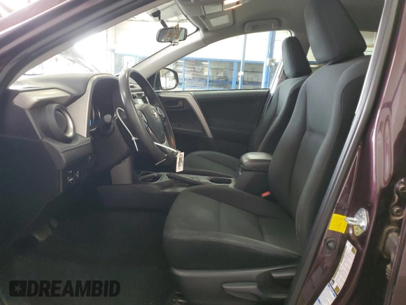 2016 Toyota RAV4 LE with VIN 2T3BFREV3GW490181, listed as a Copart auction lot 52457435 with 128,267 mi miles and Salvage Title. Bid and sale history available at DreamBid. Image 7.