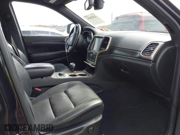 2014 Jeep Grand Cherokee Limited with VIN 1C4RJFBG4EC220054, listed as a IAAI auction lot 42050036 with 100,552 mi miles and . Bid and sale history available at DreamBid. Image 5.