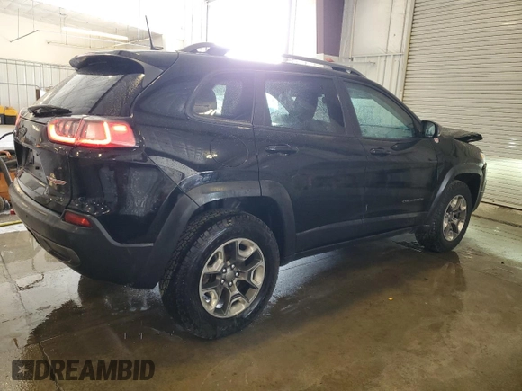 2019 Jeep Cherokee Trailhawk with VIN 1C4PJMBX1KD456551, listed as a Copart auction lot 58576065 with 121,259 mi miles and Salvage title. Bid and sale history available at DreamBid. Image 3.