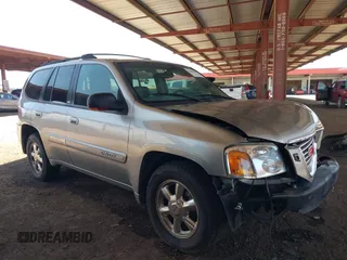 2002 GMC Envoy SLT with VIN 1GKDT13S822410875, listed as a IAAI auction lot 42660828 with 142,853 mi miles and . Bid and sale history available at DreamBid. Image 1.