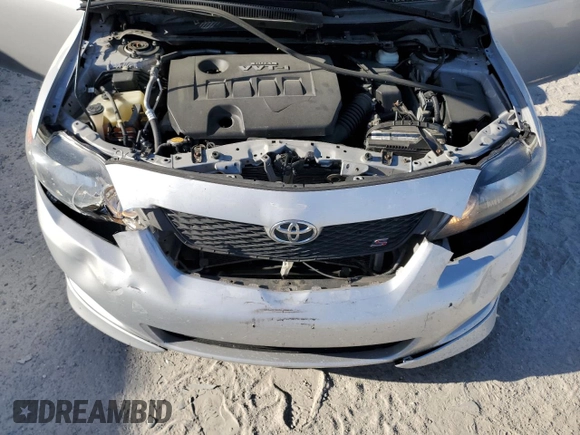 2010 Toyota Corolla z VIN 1NXBU4EE2AZ281538, wystawiony jako Copart lot #54864765 z przebiegiem 157 326 mil mil oraz Szkoda całkowita • Salvage title. Historia ofert i sprzedaży dostępna na DreamBid. Obrazek 11.