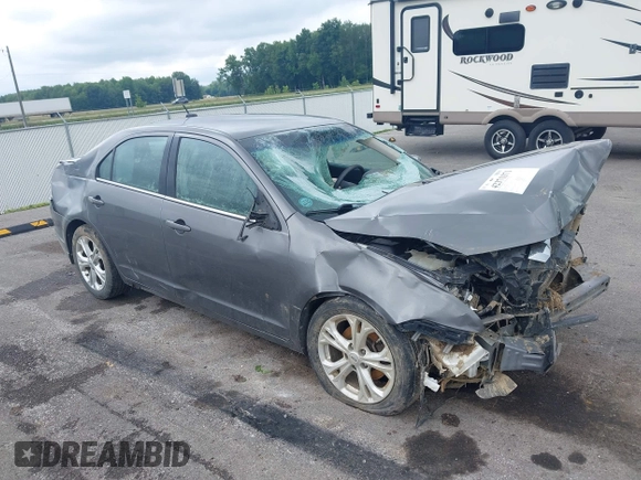 2012 Ford Fusion SE with VIN 3FAHP0HA8CR392716, listed as a IAAI auction lot 42371371 with 160,513 mi miles and . Bid and sale history available at DreamBid. Image 1.