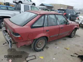 1989 Ford Escort z VIN 1FAPP959XKW361294, wystawiony jako Copart lot #83879674 z przebiegiem 12 406 mil mil oraz Szkody całkowita. Historia ofert i sprzedaży dostępna na DreamBid. Obrazek 3.