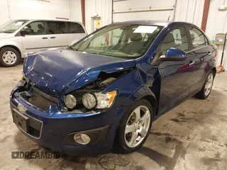 2012 Chevrolet Sonic LTZ z VIN 1G1JE5SB4C4214450, wystawiony jako IAAI lot #42207345 z przebiegiem 120 152 mil mil oraz . Historia ofert i sprzedaży dostępna na DreamBid. Obrazek 20.