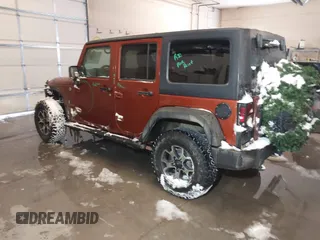 2014 Jeep Wrangler Unlimited Sport with VIN 1C4BJWDG6EL194569, listed as a IAAI auction lot 41549268 with 122,740 mi miles. Bid and sale history available at carsss.com. Image 3.