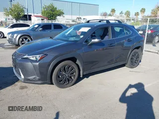 2022 Lexus UX with VIN JTHX3JBH6N2056436, listed as a IAAI auction lot 41856541 with 12,815 mi miles. Bid and sale history available at carsss.com. Image 2.