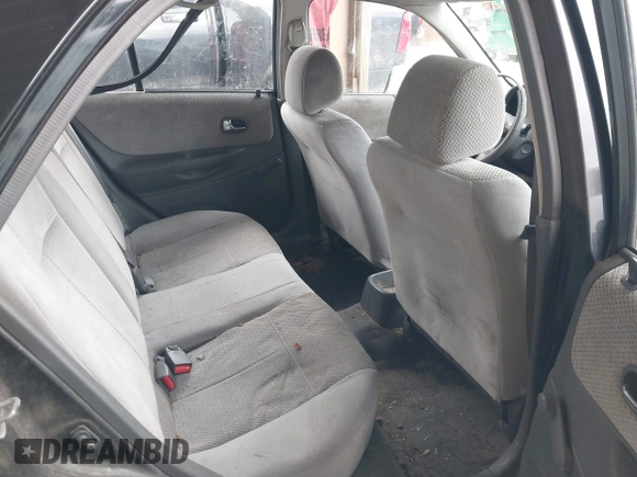 2000 Mazda Protege DX with VIN JM1BJ2227Y0303448, listed as a IAAI auction lot 41482747 with 206,542 mi miles and . Bid and sale history available at DreamBid. Image 8.