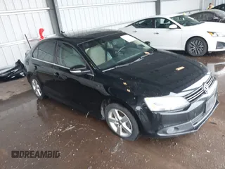 2012 Volkswagen Jetta TDI w/Premium & Nav z VIN 3VWLL7AJ8CM326549, wystawiony jako IAAI lot #42748170 z przebiegiem 200 385 mil mil oraz . Historia ofert i sprzedaży dostępna na DreamBid. Obrazek 1.