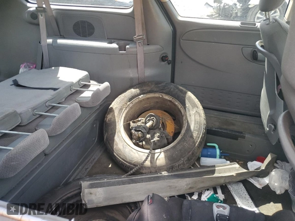 2007 Dodge Grand Caravan SE z VIN 1D4GP24R97B212024, wystawiony jako Copart lot #58008575 z przebiegiem 117 568 mil mil oraz Szkoda całkowita • Salvage title. Historia ofert i sprzedaży dostępna na DreamBid. Obrazek 11.