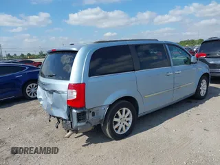 2013 Chrysler Town & Country Touring with VIN 2C4RC1BG3DR736862, listed as a IAAI auction lot 42131041 with 130,505 mi miles and . Bid and sale history available at DreamBid. Image 4.