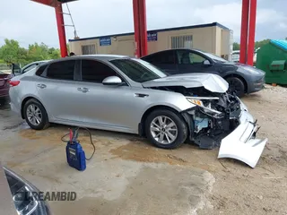 2018 Kia Optima LX z VIN 5XXGT4L3XJG231457, wystawiony jako IAAI lot #42255585 z przebiegiem 75 877 mil mil oraz . Historia ofert i sprzedaży dostępna na DreamBid. Obrazek 13.