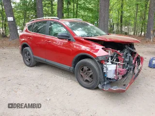 2016 Toyota RAV4 LE with VIN JTMZFREV4GJ062701, listed as a IAAI auction lot 42084694 with 121,553 mi miles and . Bid and sale history available at DreamBid. Image 1.