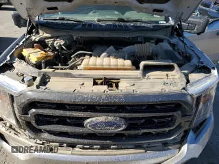 2023 Ford F-150 XL z VIN 1FTFW1E59PFC90622, wystawiony jako Copart lot #66144225 z przebiegiem 95 346 mil mil oraz Szkoda całkowita • Salvage title. Historia ofert i sprzedaży dostępna na DreamBid. Obrazek 11.