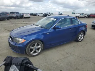 2009 BMW 1 Series 128i with VIN WBAUP93529VF49255, listed as a Copart auction lot 51100045 with 153,841 mi miles and Clean title. Bid and sale history available at DreamBid. Image 1.