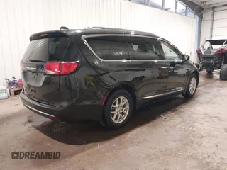 2020 Chrysler Pacifica Touring L with VIN 2C4RC1BG9LR140072, listed as a IAAI auction lot 42199118 with 93,557 mi miles and . Bid and sale history available at DreamBid. Image 4.