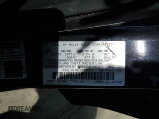 2013 Mazda 3 i Sport z VIN JM1BL1U78D1790175, wystawiony jako Copart lot #57776735 z przebiegiem 148 018 mil mil oraz Szkoda całkowita • Salvage title. Historia ofert i sprzedaży dostępna na DreamBid. Obrazek 12.