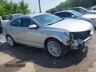 2013 Lincoln MKS with VIN 1LNHL9DK5DG602380, listed as a IAAI auction lot 42442113 with 223,066 mi miles and . Bid and sale history available at DreamBid. Image 1.