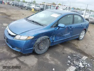 2010 Honda Civic Sdn LX with VIN 19XFA1F59AE058200, listed as a IAAI auction lot 41973667 with 165,844 mi miles. Bid and sale history available at carsss.com. Image 2.
