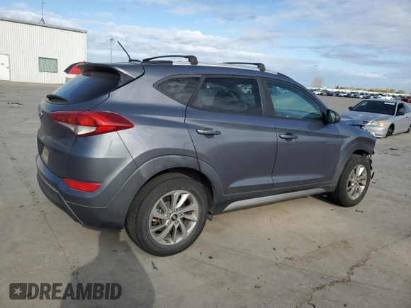 2017 Hyundai Tucson SE with VIN KM8J33A40HU330073, listed as a Copart auction lot 50713935 with 135,673 mi miles and Salvage Title. Bid and sale history available at DreamBid. Image 3.