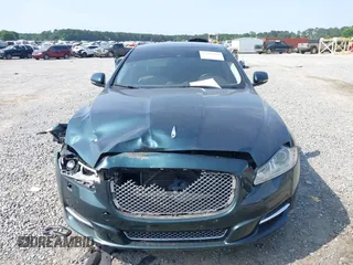 2014 Jaguar XJ Portfolio z VIN SAJWA2GZ4E8V60315, wystawiony jako IAAI lot #42293880 z przebiegiem 97 712 mil mil oraz . Historia ofert i sprzedaży dostępna na DreamBid. Obrazek 12.