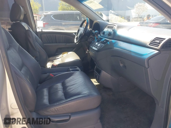 2006 Honda Odyssey EX-L with VIN 5FNRL38766B038599, listed as a IAAI auction lot 41989217 with 164,118 mi miles. Bid and sale history available at carsss.com. Image 5.