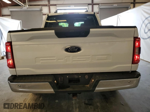 2023 Ford F-150 XL with VIN 1FTFW1EDXPFA77220, listed as a Copart auction lot 62571285 with 90,277 mi miles and Clean title. Bid and sale history available at DreamBid. Image 6.