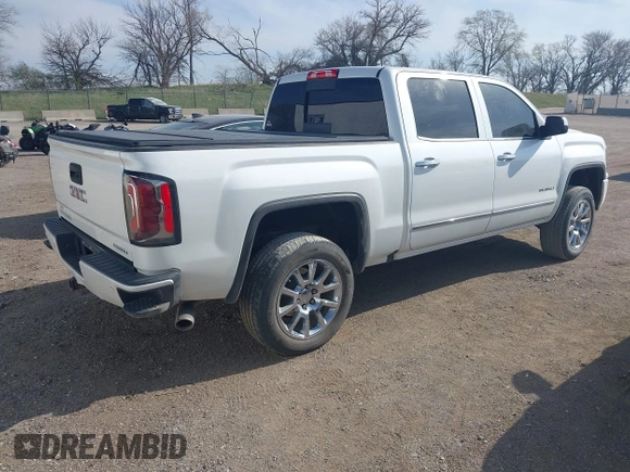 2017 GMC Sierra 1500 Denali z VIN 3GTU2PEC8HG502379, wystawiony jako IAAI lot #42040538 z przebiegiem 108 960 mil mil oraz . Historia ofert i sprzedaży dostępna na DreamBid. Obrazek 4.