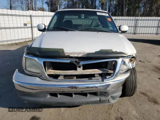 2000 Ford F-150 XL with VIN 1FTRX17L1YNA26050, listed as a Copart auction lot 43597105 with 205,152 mi miles and Salvage Title. Bid and sale history available at carsss.com. Image 5.