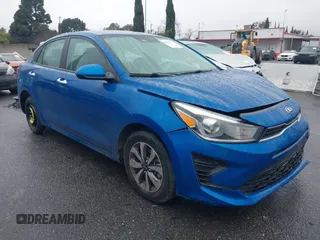 2021 Kia Rio S with VIN 3KPA24AD3ME413096, listed as a IAAI auction lot 41489347 with 27,183 mi miles. Bid and sale history available at carsss.com. Image 1.