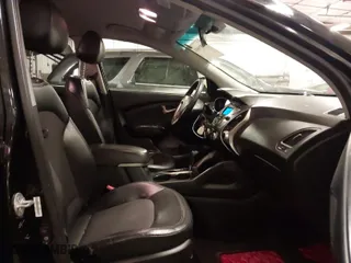 2013 Hyundai Tucson GLS with VIN KM8JU3AC0DU754948, listed as a IAAI auction lot 41811891 with 139,056 mi miles. Bid and sale history available at carsss.com. Image 5.