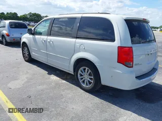 2014 Dodge Grand Caravan SXT with VIN 2C4RDGCGXER322705, listed as a IAAI auction lot 42170301 with 147,070 mi miles and . Bid and sale history available at DreamBid. Image 3.