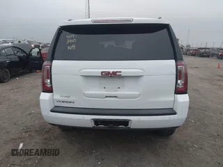 2018 GMC Yukon SLT with VIN 1GKS1BKC3JR279163, listed as a IAAI auction lot 40973940 with 122,445 mi miles. Bid and sale history available at carsss.com. Image 16.